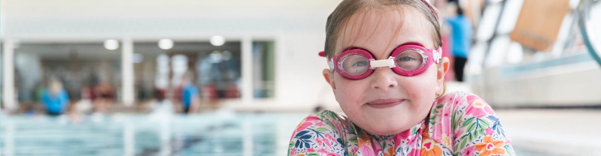 Girl in pink goggles